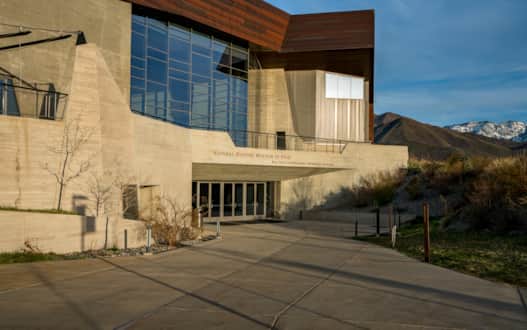 The Natural History Museum of Utah is housed in the Rio Tinto Center, which was uniquely constructed with 42,000 square feet of shining copper mined locally.