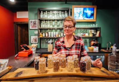 Co-owner Ashley Cross explains the ingredients in New World Distillery's gin.