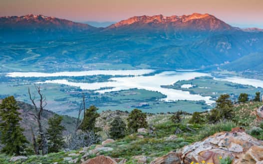 Head east from Downtown Ogden on State Route 39 and drive the scenic byway through a glimmering canopy of cottonwoods along the Ogden River. Jagged quartzite rocks tower above you until you reach Pineview Reservoir.