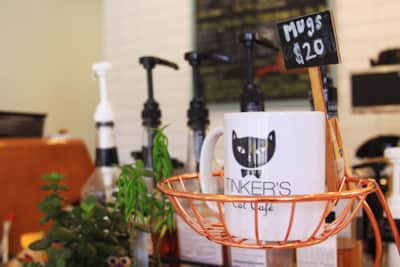 The Tinker Cat Cafe offers coffee, espresso, lattes, teas and locally-baked pastries.