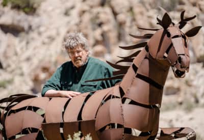 Bob Leonard with an art installation at Fremont Indian State Park Museum.
