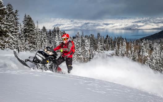 Sledding through the backcountry can get you a lot closer to nature than riding a chairlift.