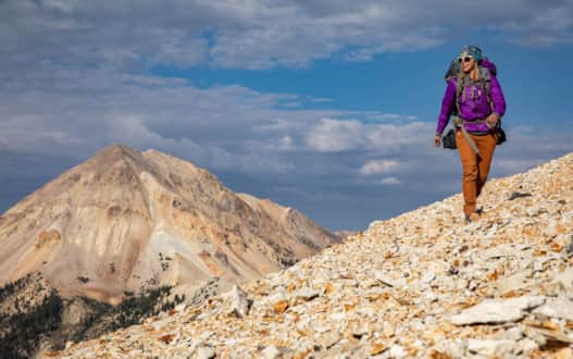 Hiker traversing to Mount Baldy.