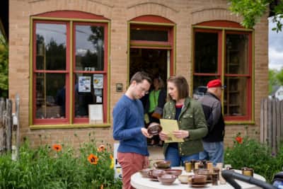 On Heritage Day, thousands of locals and travelers gather for community meals, art auctions, craft fairs, performances, open studios and home tours to celebrate the town’s distinct culture and storied history. 