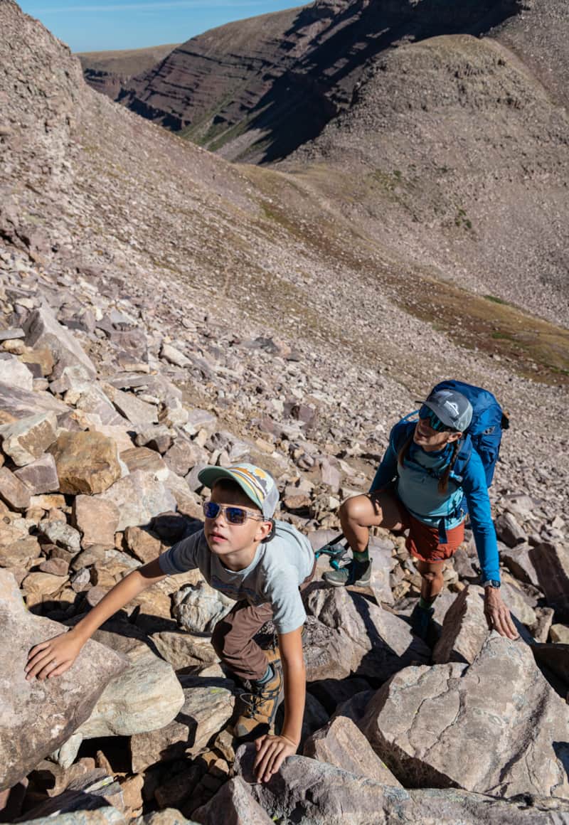 After cresting Gunsight Pass (11,880 ft) the Dome Peak Cutoff Trail traverses into scree and talus.