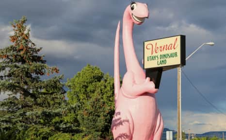 The 40-foot-tall pink dinosaur named Dinah welcomes visitors to Vernal with a sign proclaiming, "Utah's Dinosaur Land."