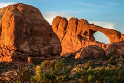 The red rock of Arches National park truly comes alive during sunset at Skyline Arch.