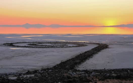 It took six days, 625 man-hours, 292 truck-hours, $9,000, and 6,500 tons of basalt, limestone and mud to construct the Spiral Jetty sculpture.