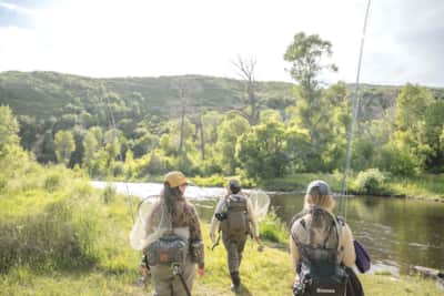 Gear in hand, making the trek to Middle Provo River in Heber.