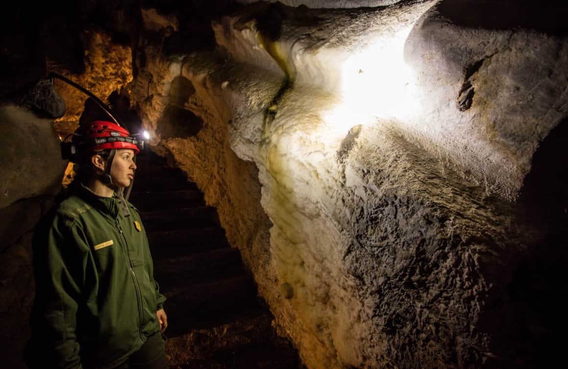 When caving, remember to carry multiple light sources secured to yourself or your pack.
