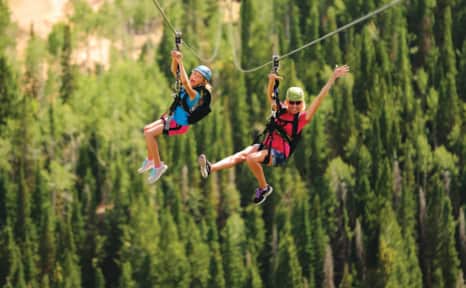 Soar through the sky at exhilarating speeds on Park City's ZipRider and take in the breathtaking panoramic views of the landscape below.