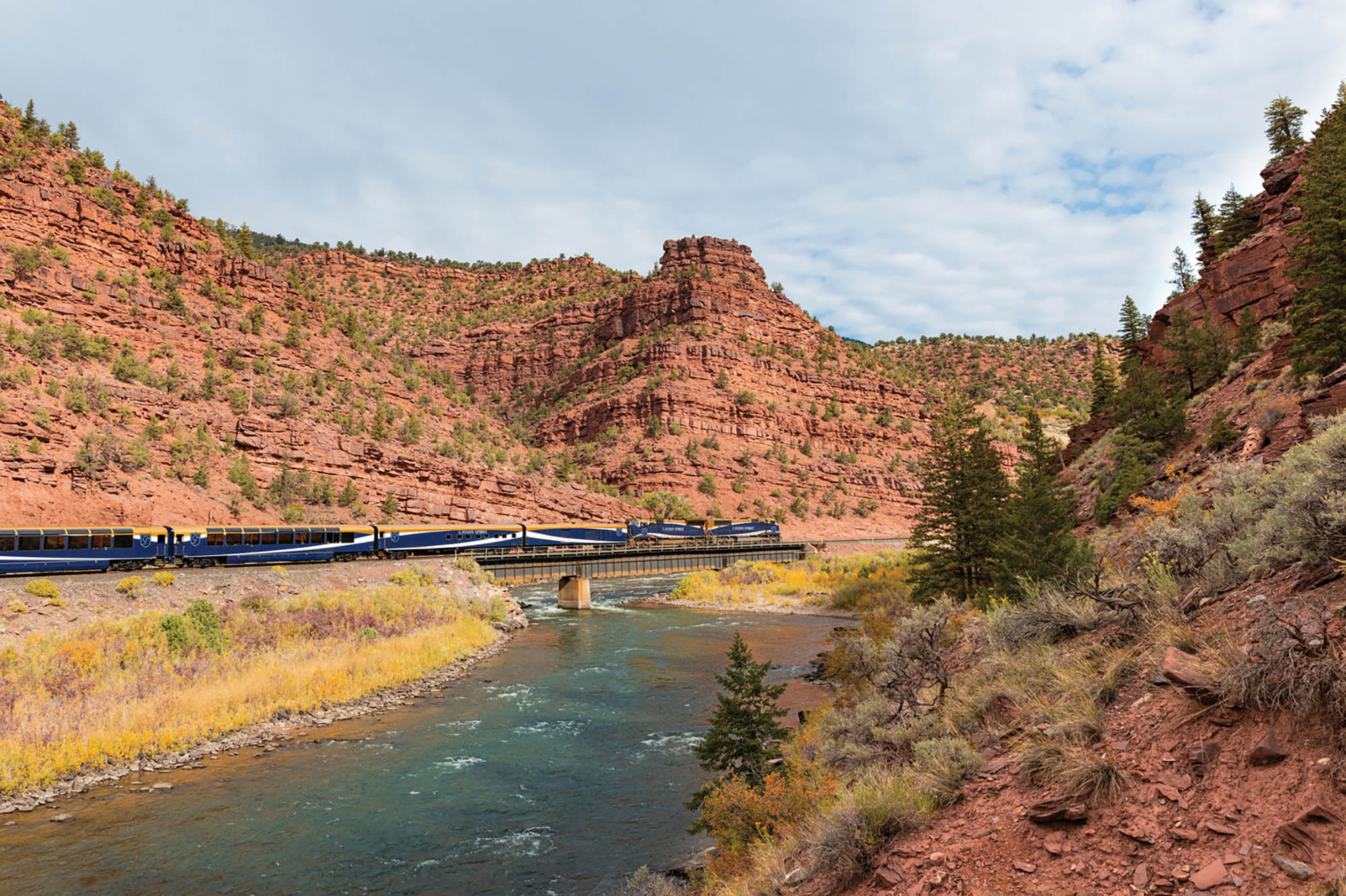 This two-day rail journey is steeped in history and panoramic views — think breathtaking plains, mountain vistas and chromatic deserts alongside towering red rock canyons carved by the Colorado River.