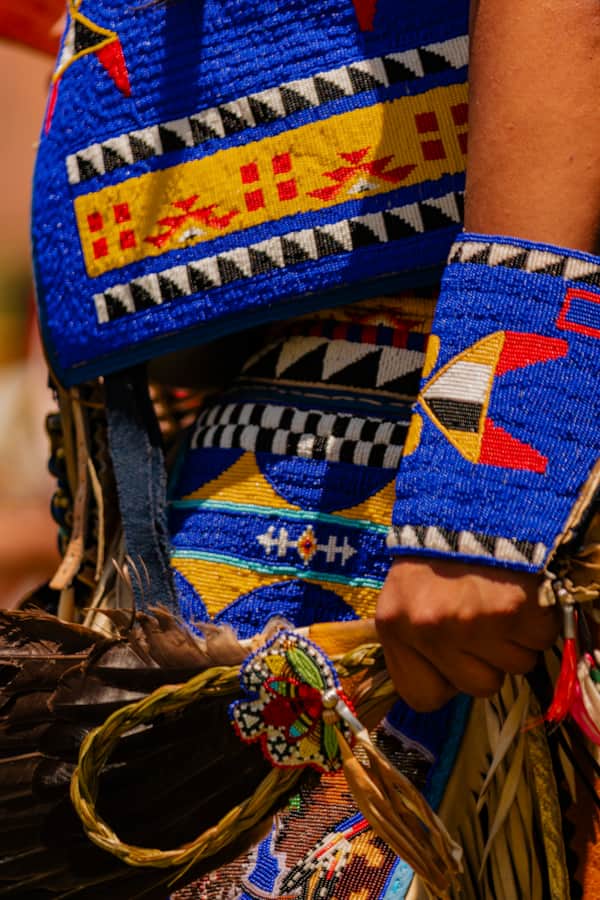The details of regalia dress are symbolic of one's connection with ancestors and the land they call home.