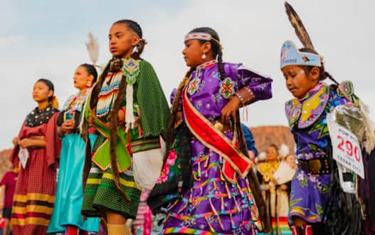 Young members of the Paiute Tribe wear their regalia to celebrate the restoration of their Tribe's federal recognition.