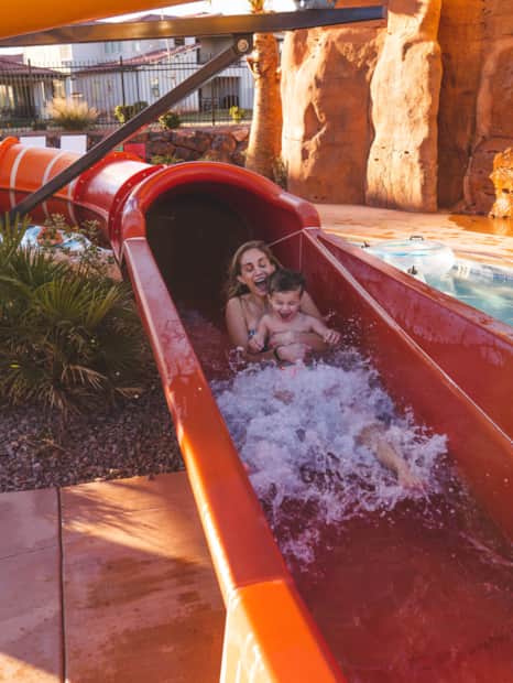 Brace for excitement! The large water slide at Arcadia Resort offers exhilarating drops and twists, promising squeals of delight for thrill-seekers of all ages.