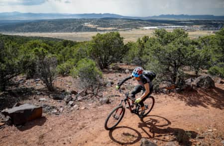 Mountain biker riding the Lichen It Trail near Cedar City.