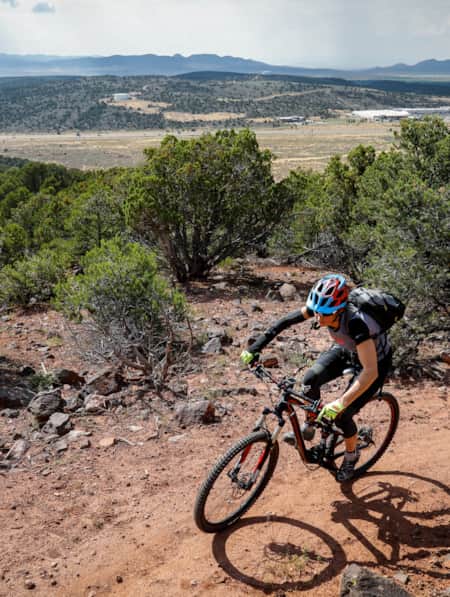 Mountain biker riding the Lichen It Trail near Cedar City.