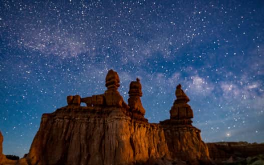 As dusk settles, Goblin Valley transforms into a vast observatory. See countless stars in one of Utah's prime dark sky locations.