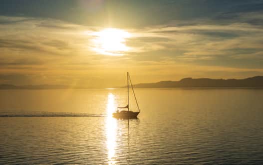 Enjoy Great Salt Lake State Park from the water — sunset boat tours are available for booking.