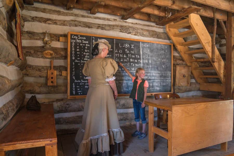 Visit the frontier schoolhouse to try your hand at the Deseret alphabet.