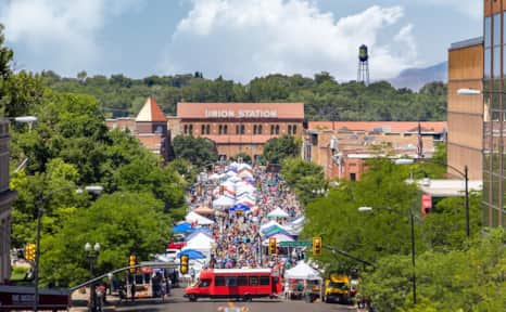 On Saturday mornings from June through September, the Farmers Market Ogden spans 25th street toward Union Station.