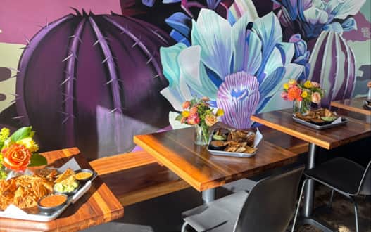 Fácil balances classic dishes like Chicken Tinga and Pork Carnitas with inventive items such as the Nashville Hot Chicken Taco and Glazed Pork Belly Burrito.