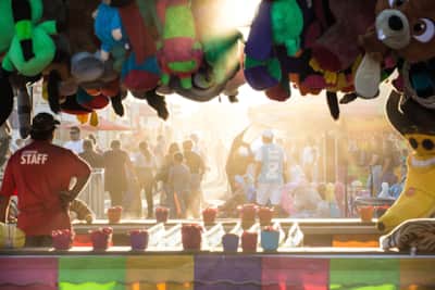 The excitement of the Utah State Fair comes to life with a mix of midway games, classic rides and fairgoers soaking up the fun.