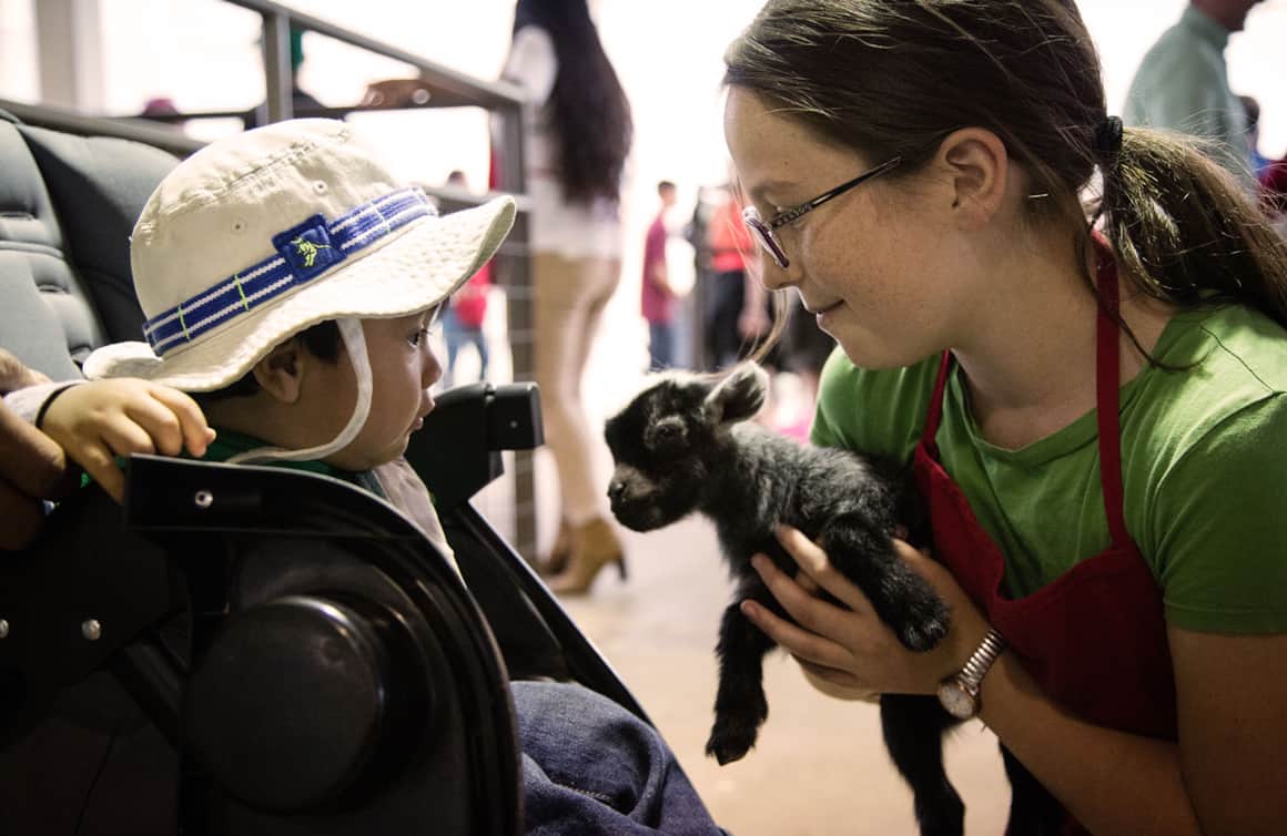Utah Farm Bureau’s Barnyard Friends is a hands-on experience where you can meet newborn farm babies like lambs, goat kids and calves.