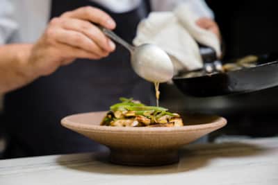 Table X prides itself on “no shortcuts” – from the bread and butter course to dessert, every sauce, soup, and sausage is handmade in-house from scratch.
