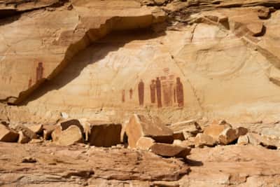 These finely detailed panels draw the eyes to dozens of human figures, symbols from another time.