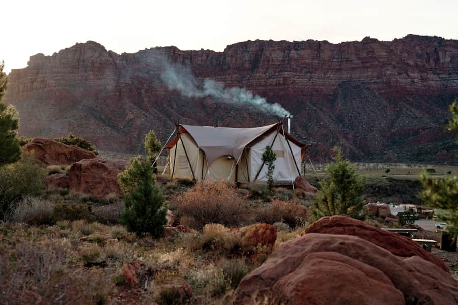 Wake up to breathtaking views of Zion's red rocks right from your tent.
