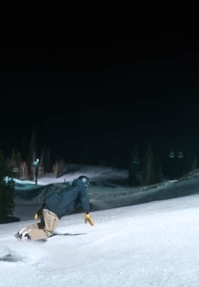 A nighttime snowboarding session at Brighton Resort.