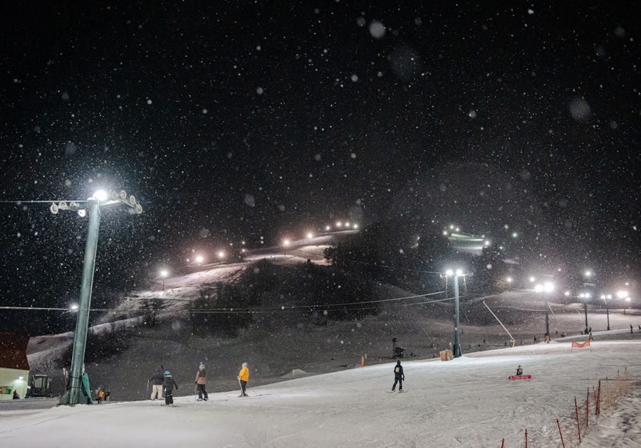 Drifting snowflakes and softly lit slopes create a magical night skiing experience at Nordic Valley.
