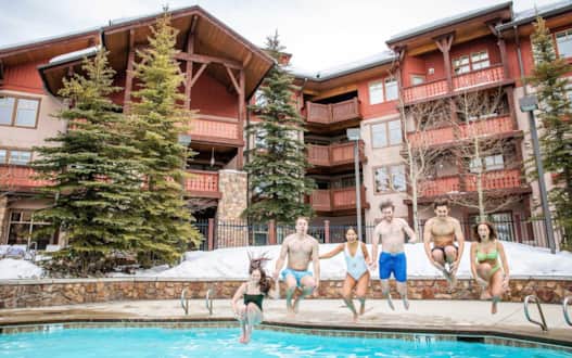 Their heated pool and hot tub are the perfect places for the whole family to unwind in the winter.