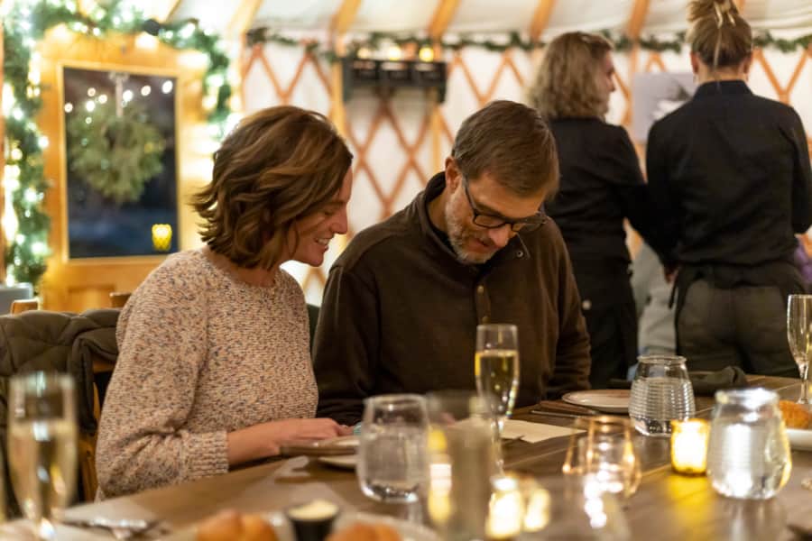 Inside the cozy yurt, delicious drinks, mouth- watering food and a welcoming warmth await.