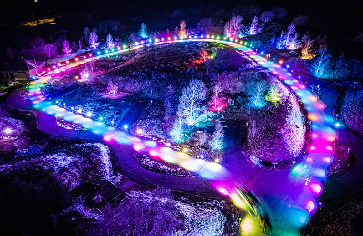 An open sleigh in a snow-covered forest is pure winter fun.