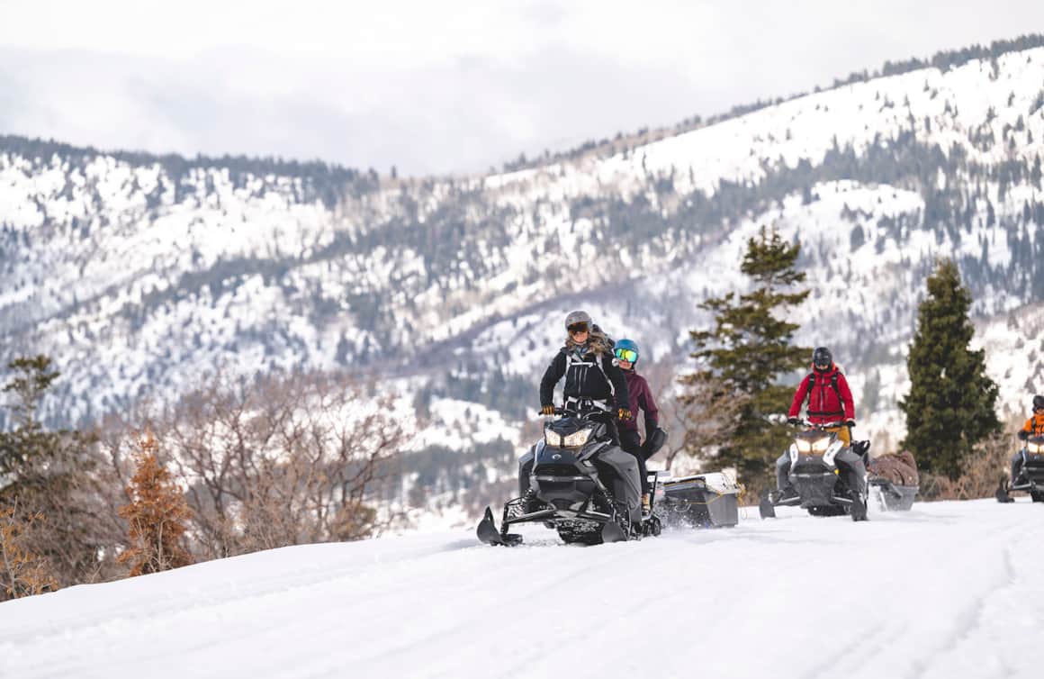 Shaun Deutschlander, Melissa Fields, Rachael Burks and Sam Thackeray use snowmobiles to access and transport gear to the yurt.