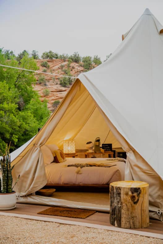 A stay at Cave Lakes Resort is inextricably woven into the surrounding red rock landscape and natural swimming pools.