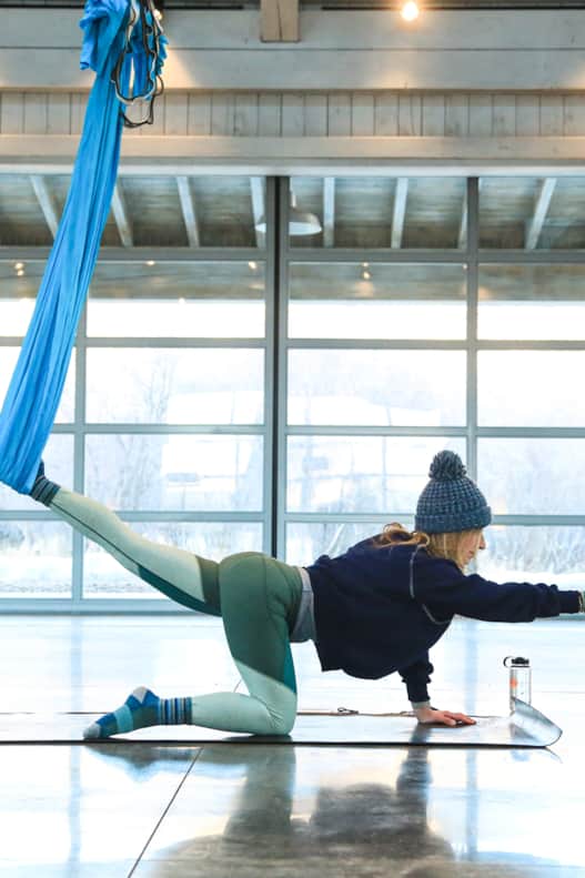 Park City Yoga Adventures offers restorative yoga-in-silk-hammocks sessions in a heated white-timber-and-glass barn.