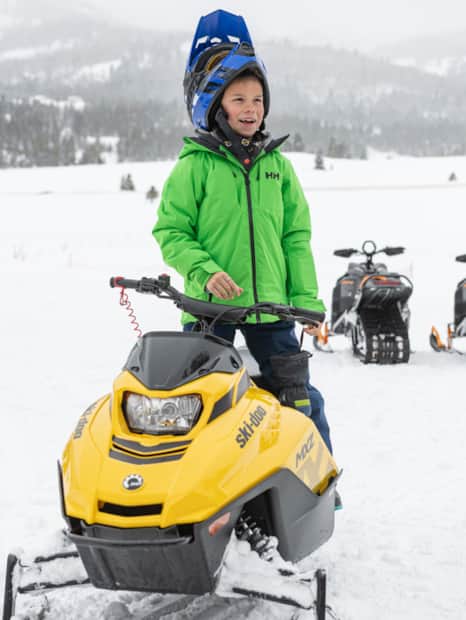 Dusty was very excited to have his own snowmobile for touring around Beaver Creek Lodge.