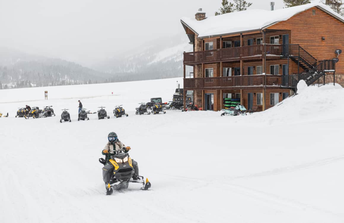 Heading out from Beaver Creek Lodge for a day of snowmobiling in the mountains of Logan Canyon.