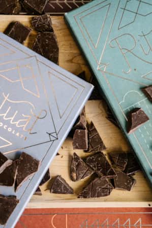 Two packaged chocolate bars from a company called Ritual, displayed as a product shot.