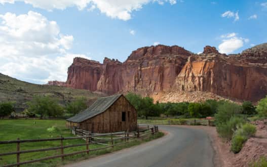 Explore the ghost town of Fruita, located at the heart of Capitol Reef National Park.
