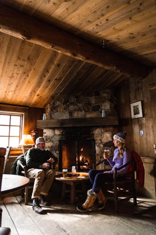A couple enjoying a drink at Owl Bar at Sundance Resort.