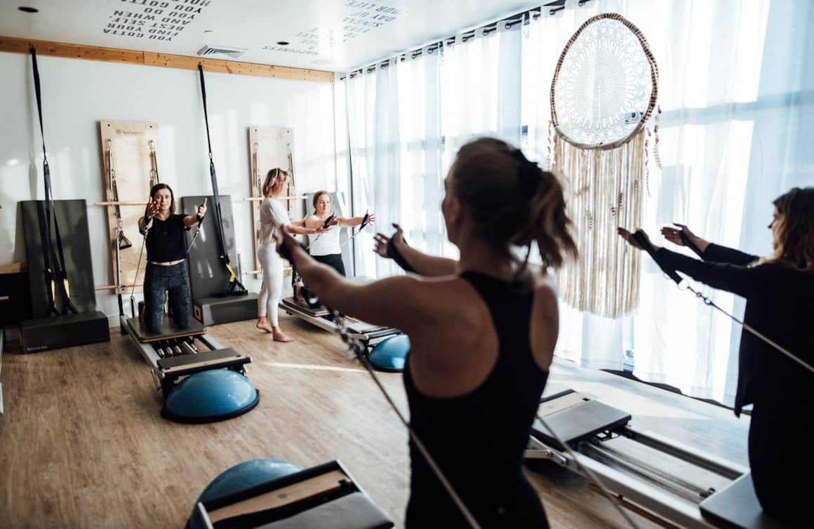 Tessa Arneson teaching at the Maven Strong studio, part of Salt Lake City’s Maven District.