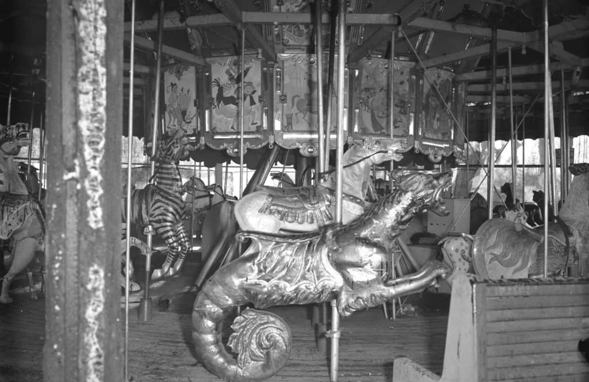 The Carousel debuted in 1918, though its 47 intricately hand-painted and hand-carved animals — horses, zebras, frogs in bow ties — were made by European-trained craftsmen even earlier, in 1893.