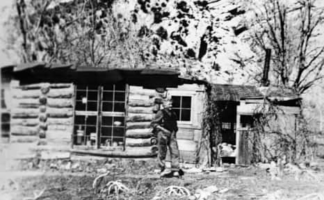 Josie Bassett Morris by her cabin. Used by permission, Uintah County Library Regional History Center, all rights reserved.