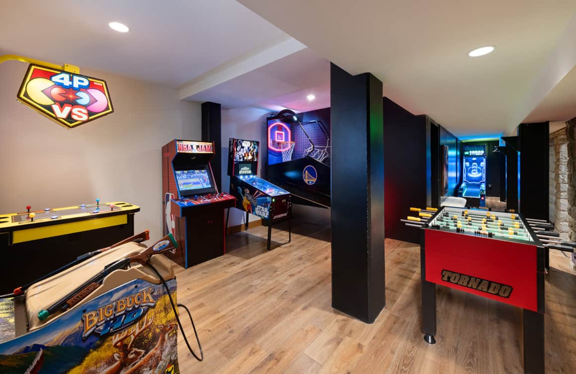 The Snowpine Lodge features a fully stocked game room, including a four-player Pac Man Battle Royale.