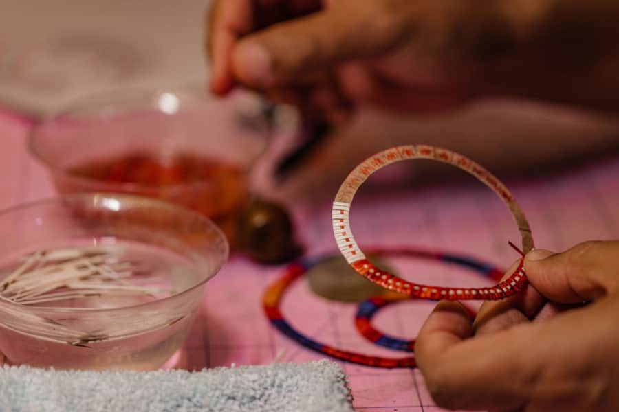 Groves uses porcupine quills to create woven embellishments.