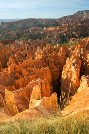 A vast valley filled with red rock hoodoos.